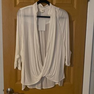 Brand new white long sleeve top